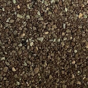 Natural Timber TAMKO Asphalt Shingles - A close-up view of Tamko's Natural Timber Asphalt Shingles, featuring a blend of warm browns and hints of copper for a natural and durable roofing option that enhances the natural beauty of your home.