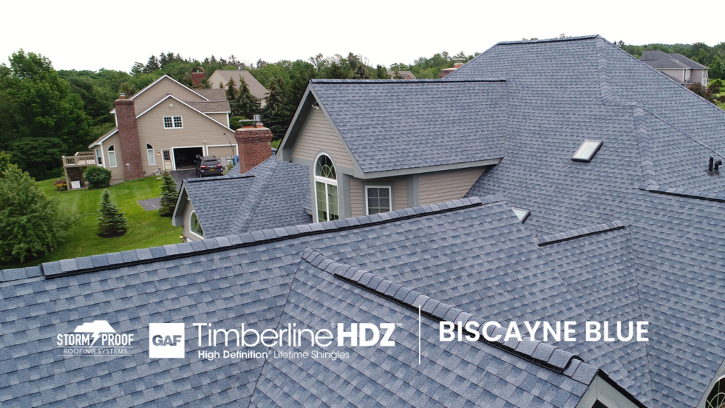 Biscayne Blue Shingles Installed by Storm Proof Roofing Systems - GAF Timberline HDZ Shingles: Harvest Blend Color