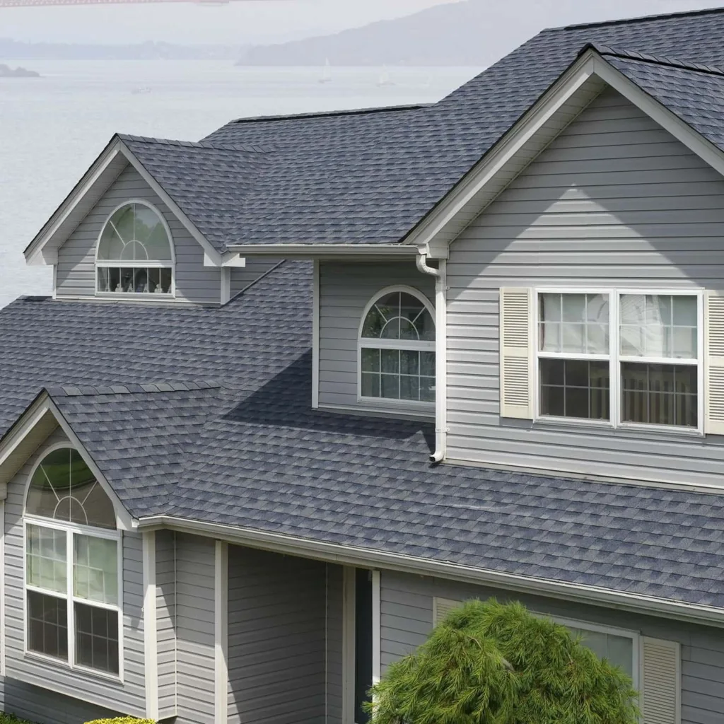 Storm Proof Roofing Systems' Masterpiece: Timberline HDZ Shingles in Vibrant Biscayne Blue