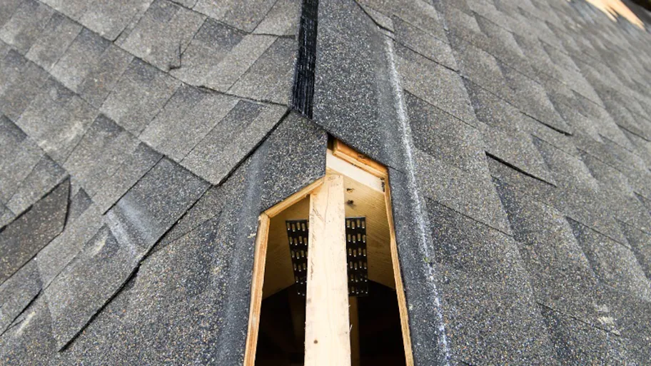 Seamless appearance with shingle-over ridge vent