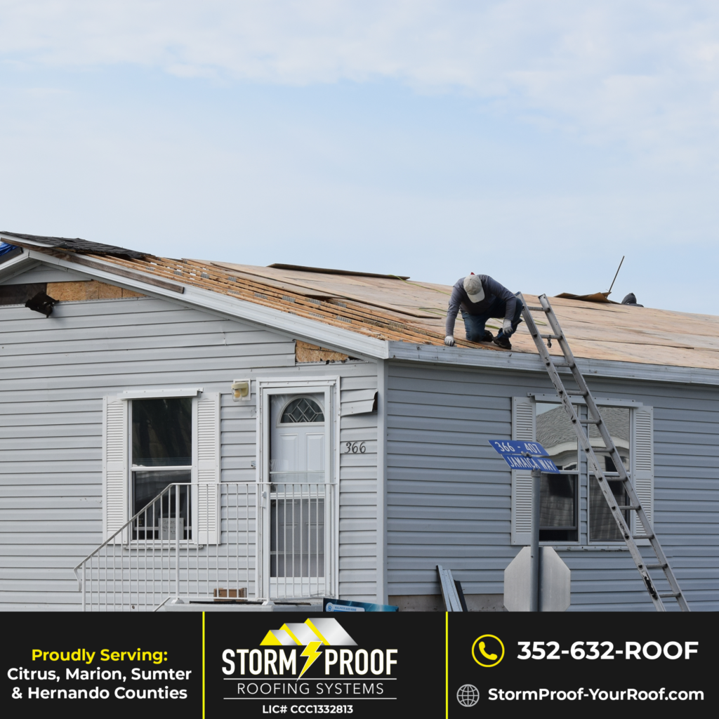 Expert Roofers in the Process of a Roof Tear-Off