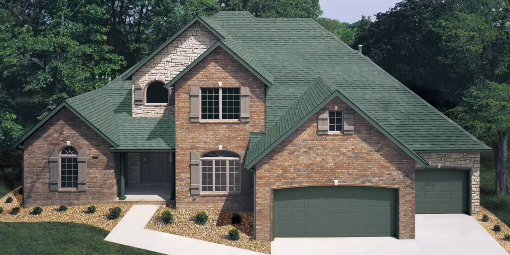 Textured asphalt shingles in a rustic evergreen color.