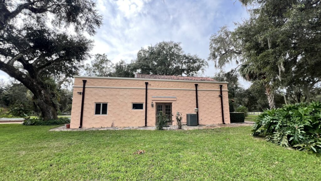 Newly completed TPO flat roof on a residential property in Inverness, Florida, highlighting its sleek and reflective surface.