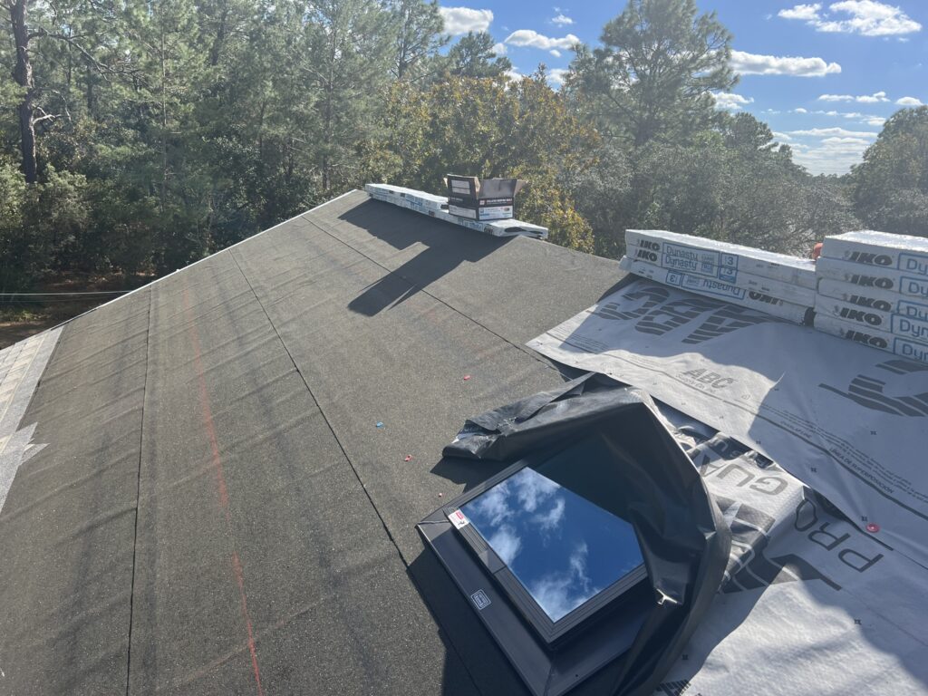 A Citrus County homeowner reviewing roofing financing options with a consultant.