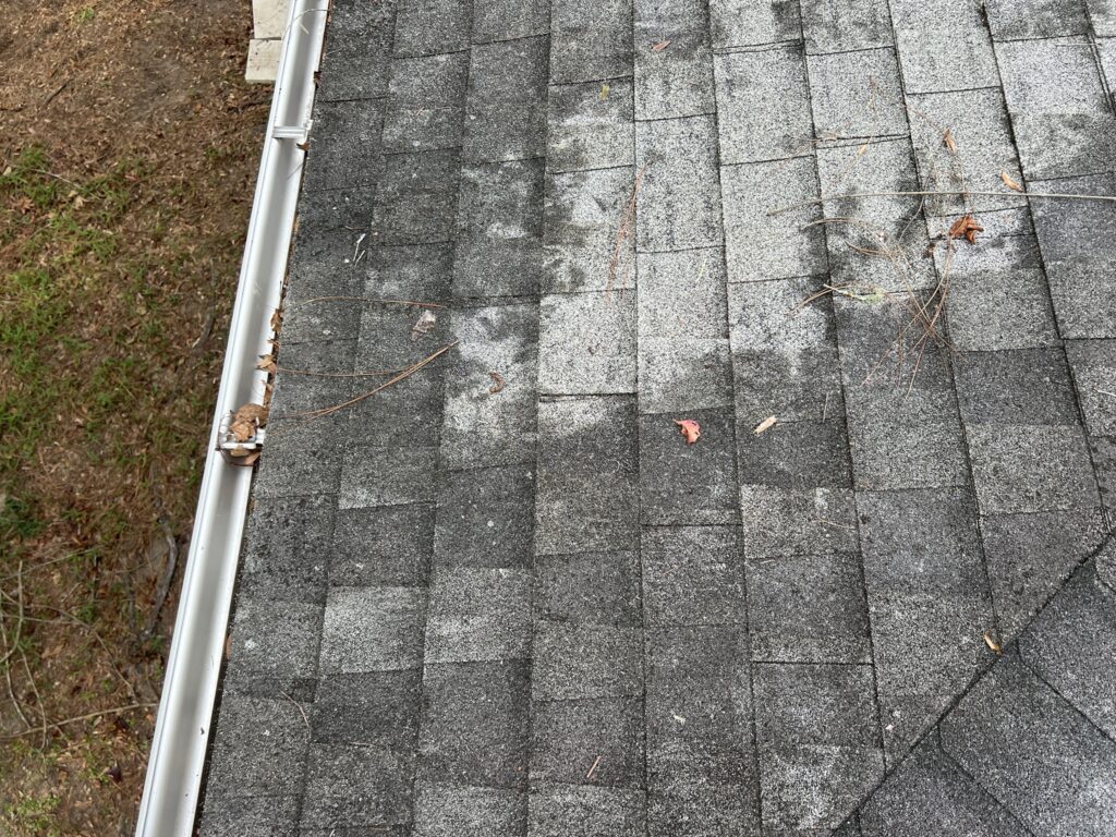 Newly installed shingle roof on a residential property in Inverness, FL.