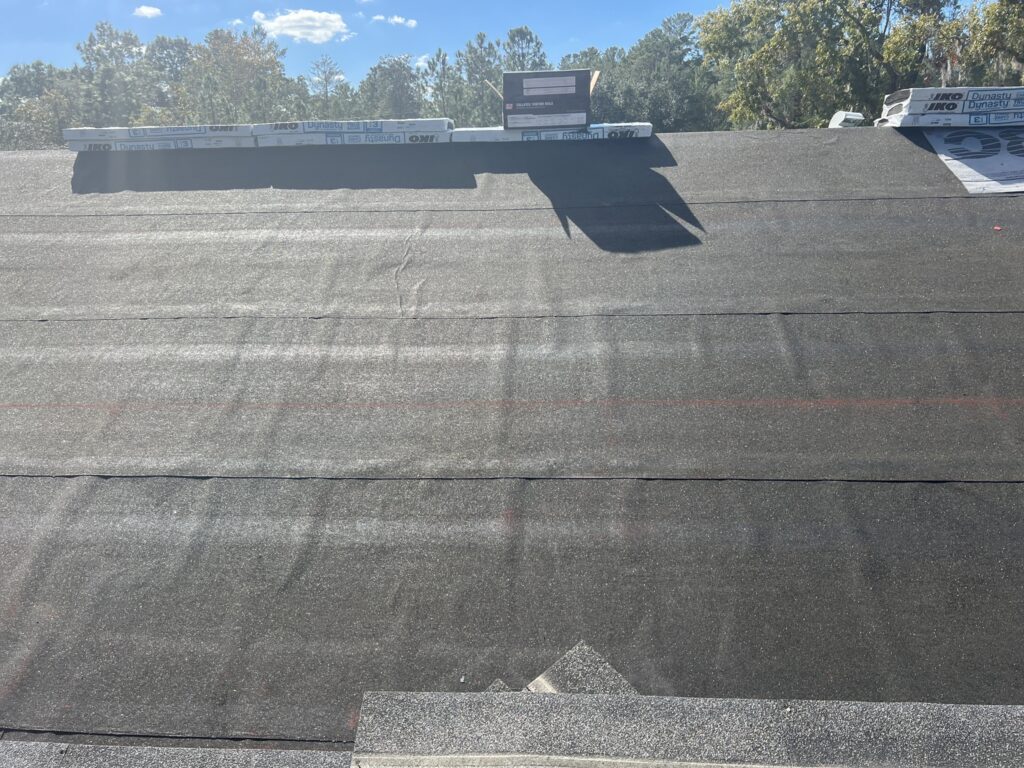 View of a well-maintained residential roof in Citrus County, Florida, under a sunny sky.