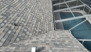 Expert shingle roofing contractors working on a roof in Inverness, Florida.